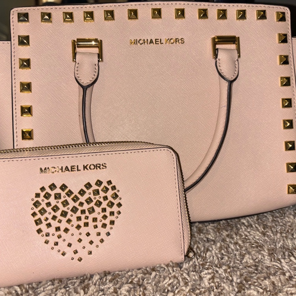 Pink & gold studded Michael lots manhattan bag & matching wallet .